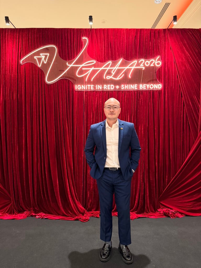 Jacky Yong wearing a navy suit at a 2026 gala