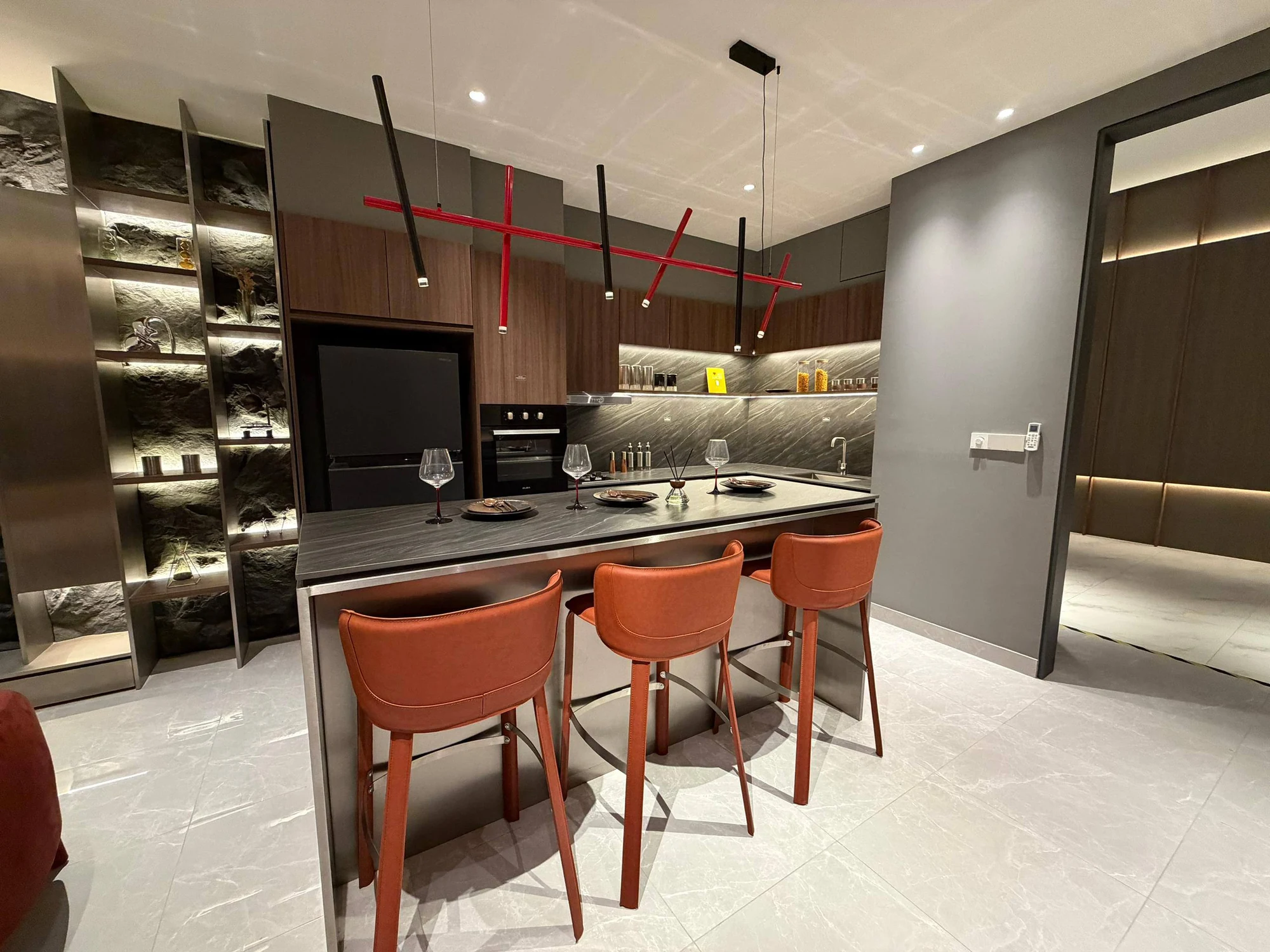 Kitchen counter and dining stools in the Khaya Residences Type A show unit